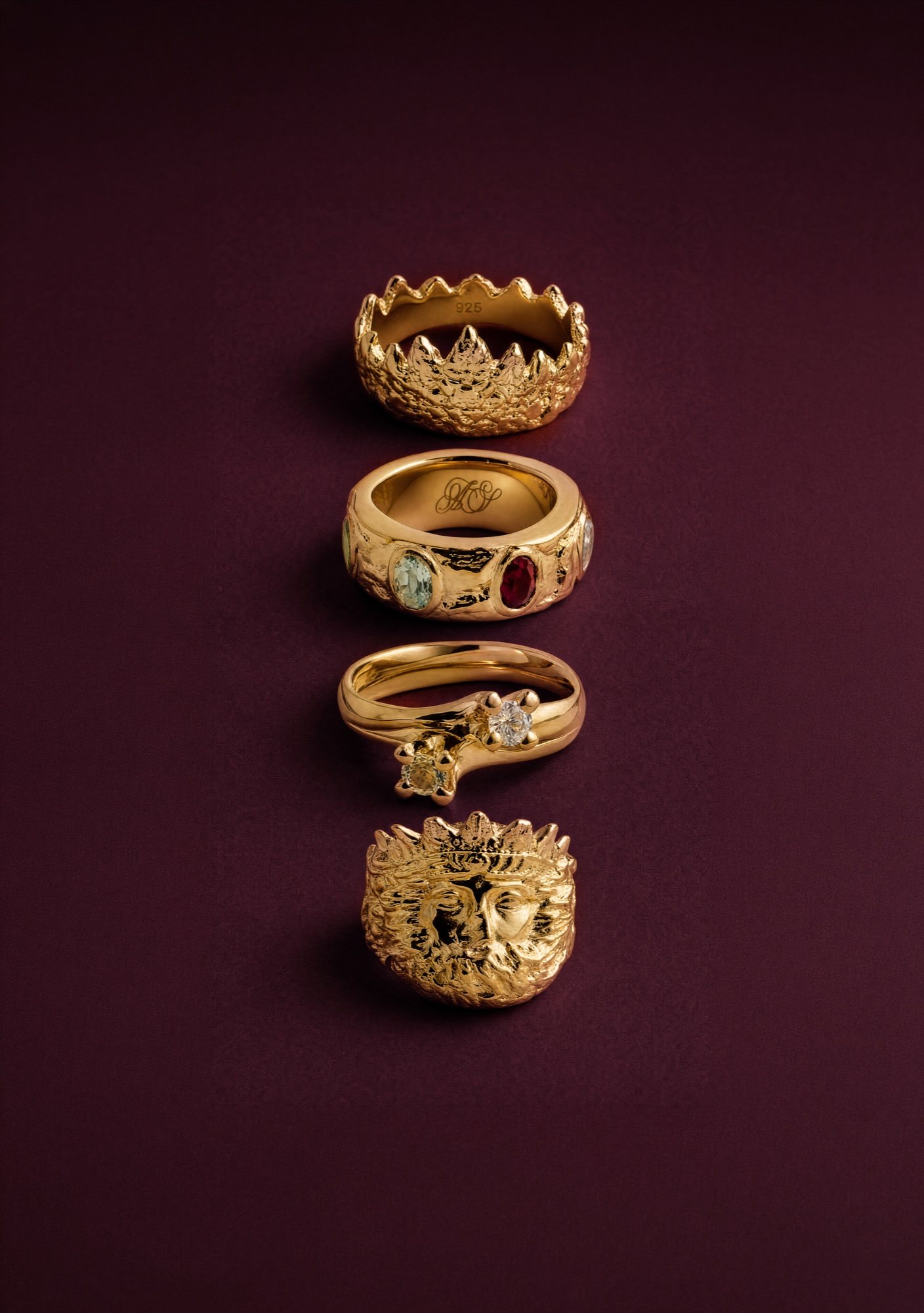 Four Acauã rings: Tower, Regent, Halo and Crown in gold