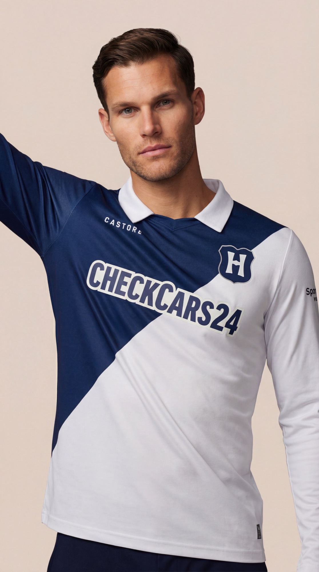 Hertha BSC kit worn, arm raised, showing drape through movement