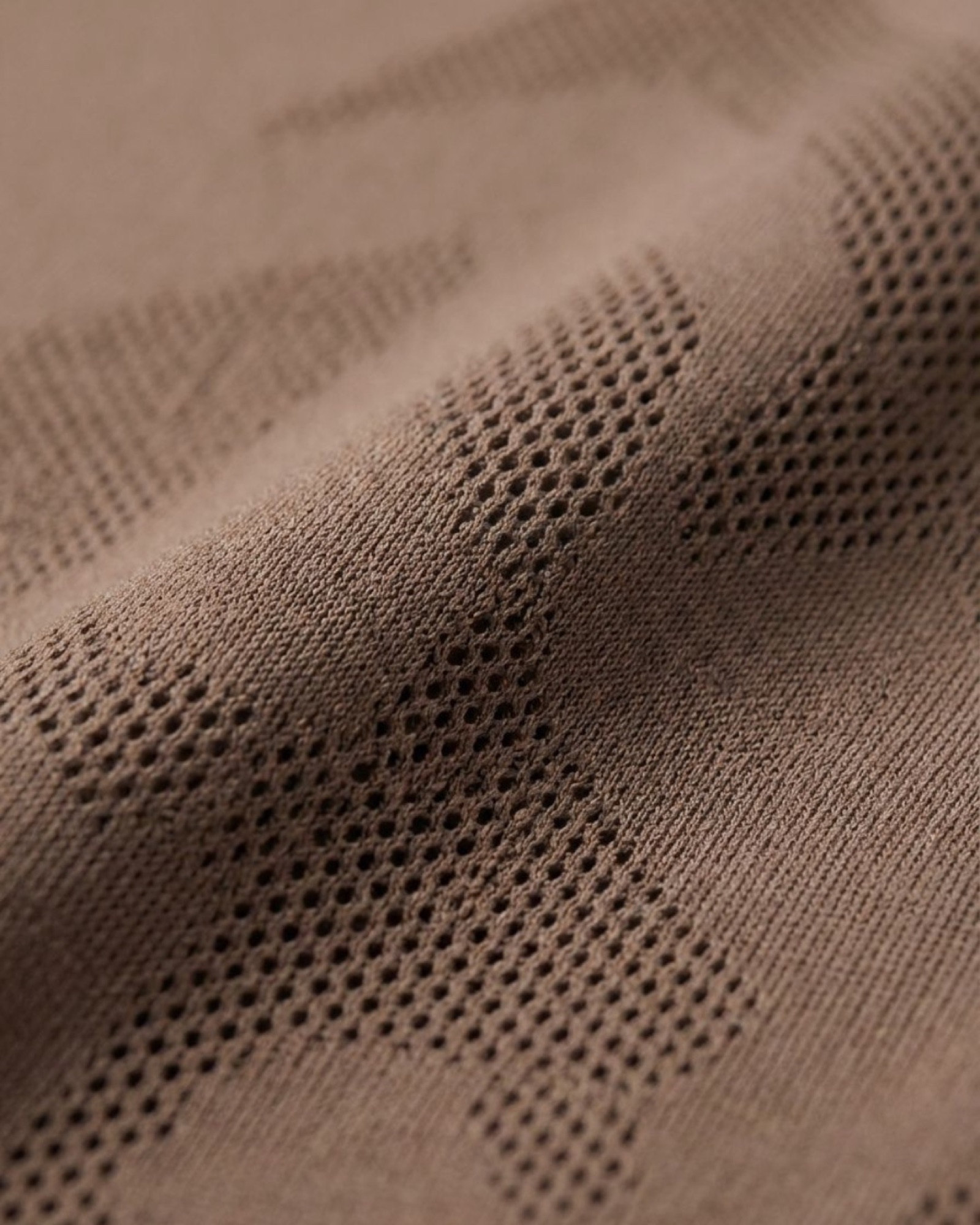 Macro detail of the engineered-knit ventilation structure