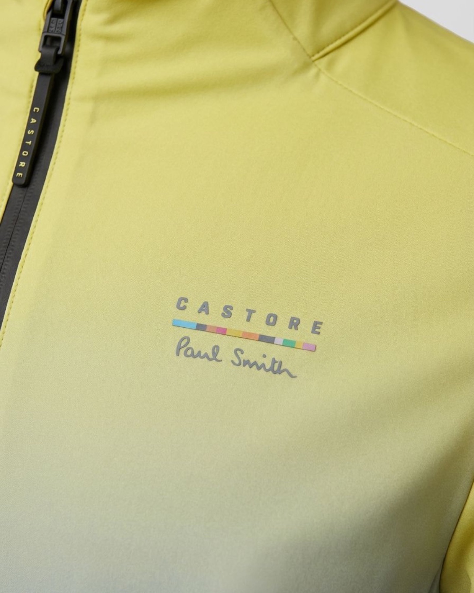 Castore and Paul Smith co-brand lockup with the Paul Smith stripe