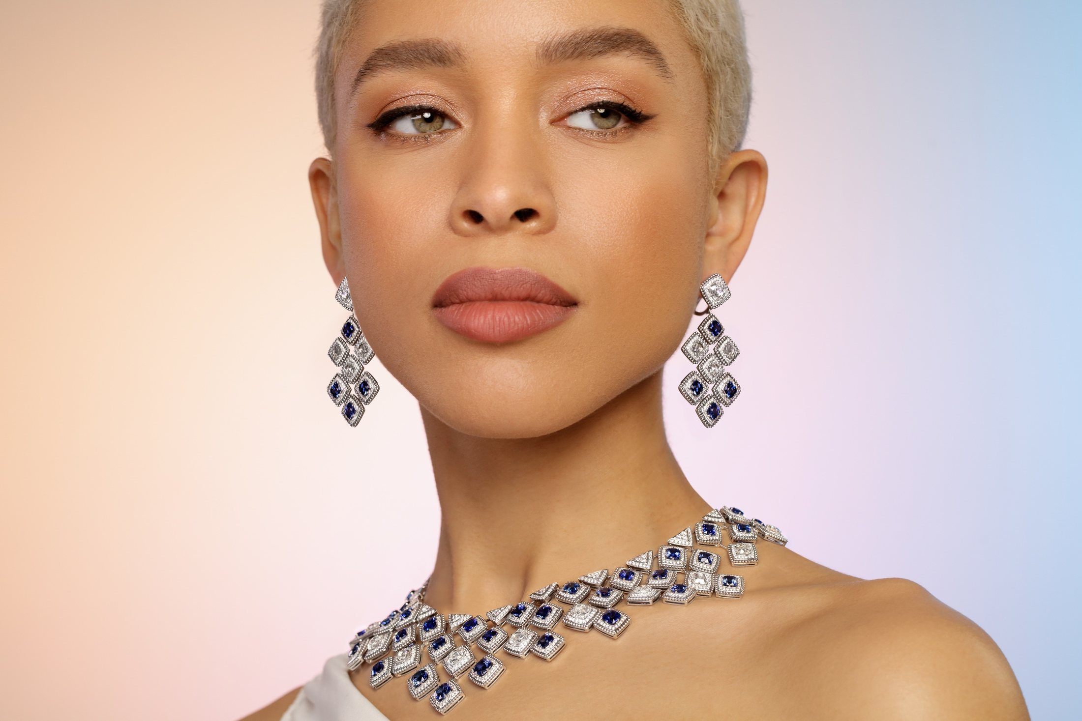 David Morris bridal campaign, statement diamond earrings and choker on a gradient backdrop