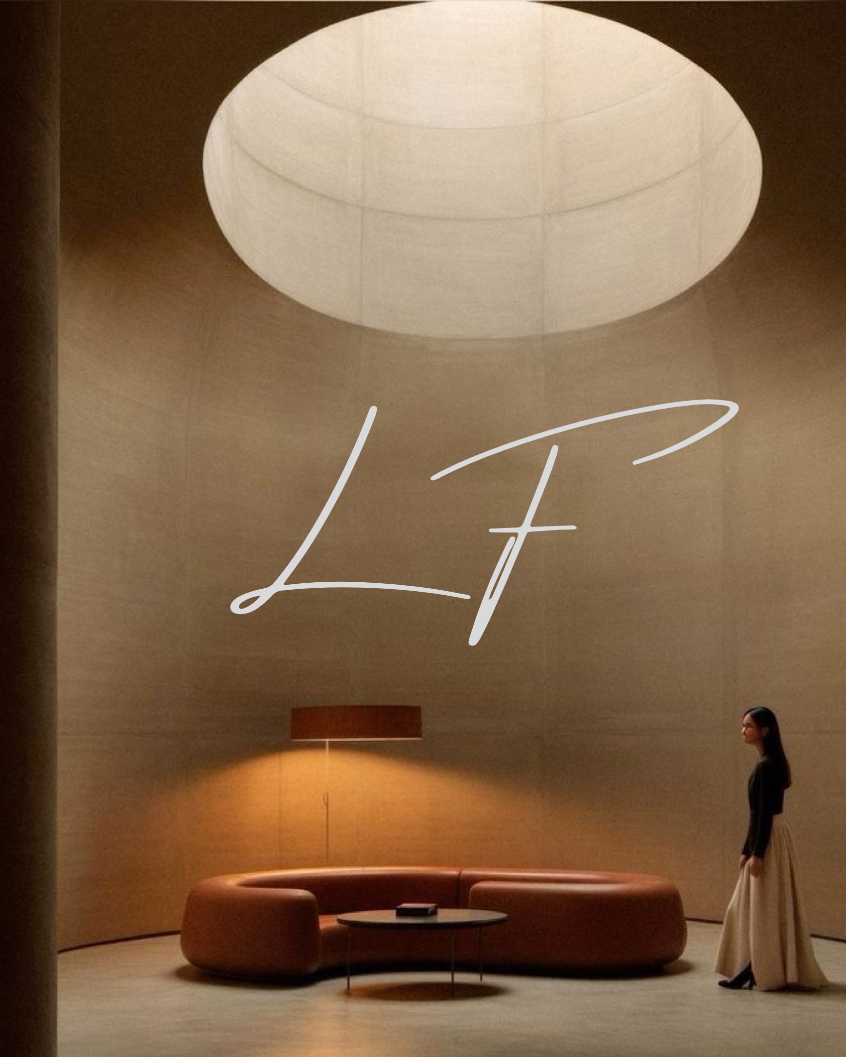 The LF monogram set over a lit interior