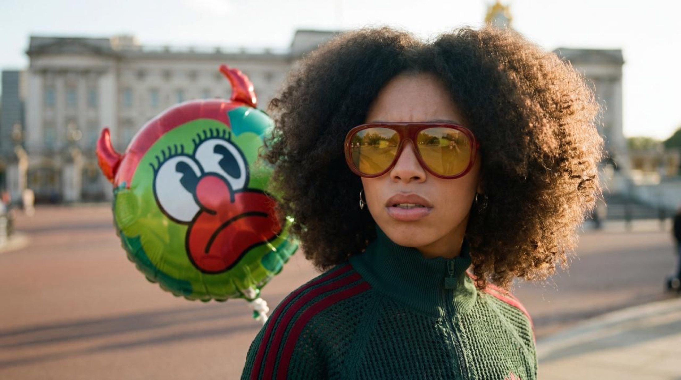 The Slawn character balloon beside the model, Palace behind