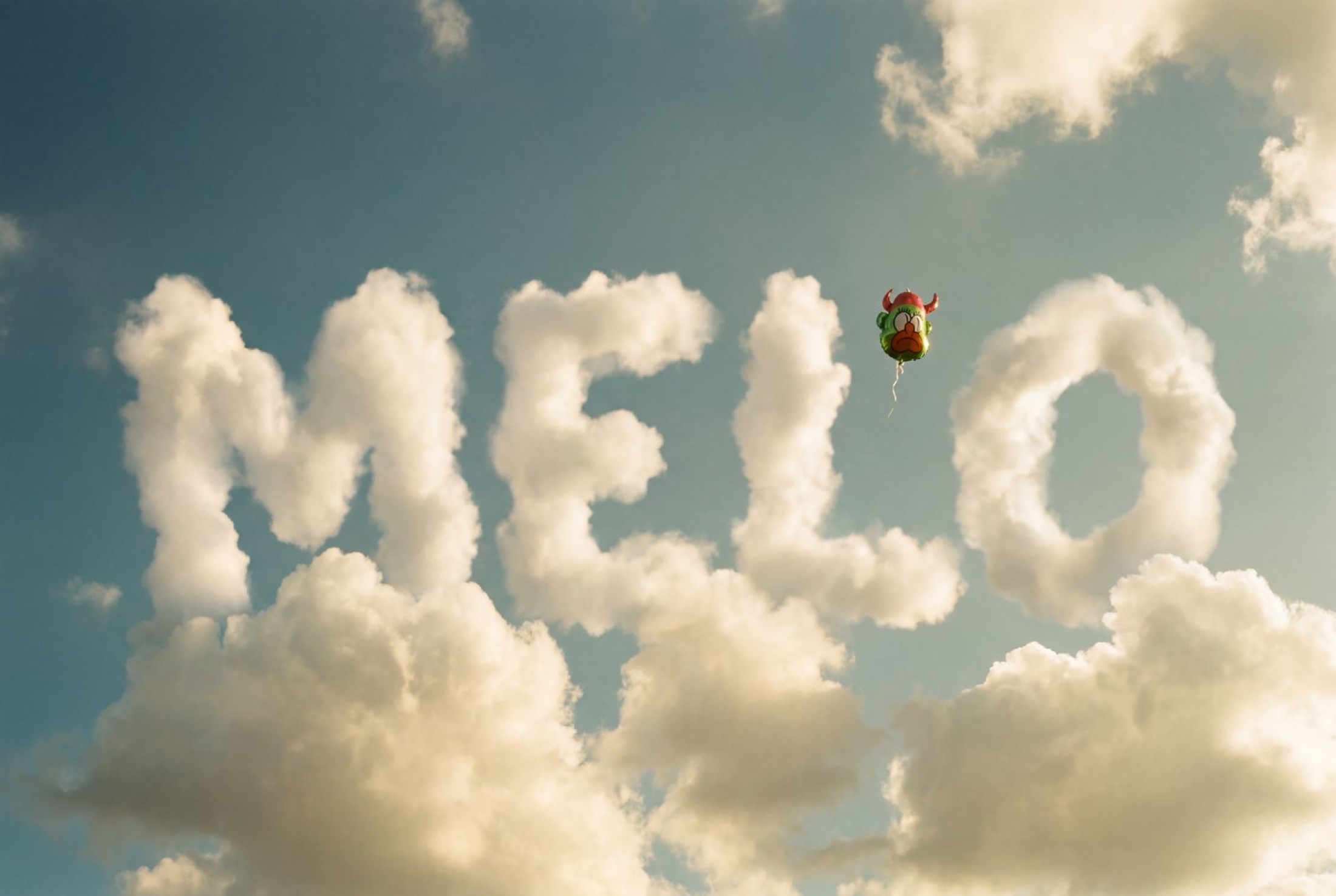 MELO written in cloud formation above London