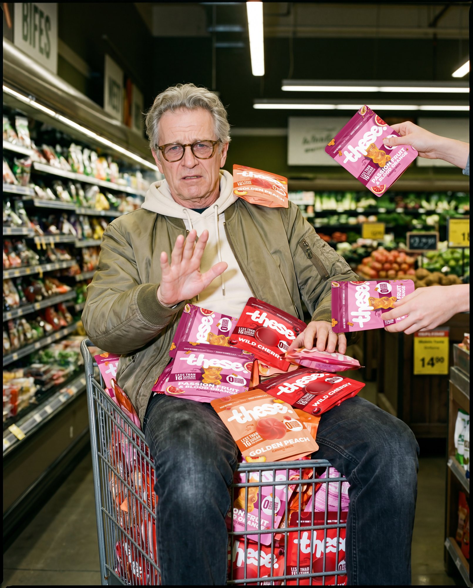 A shopper with an overflowing trolley