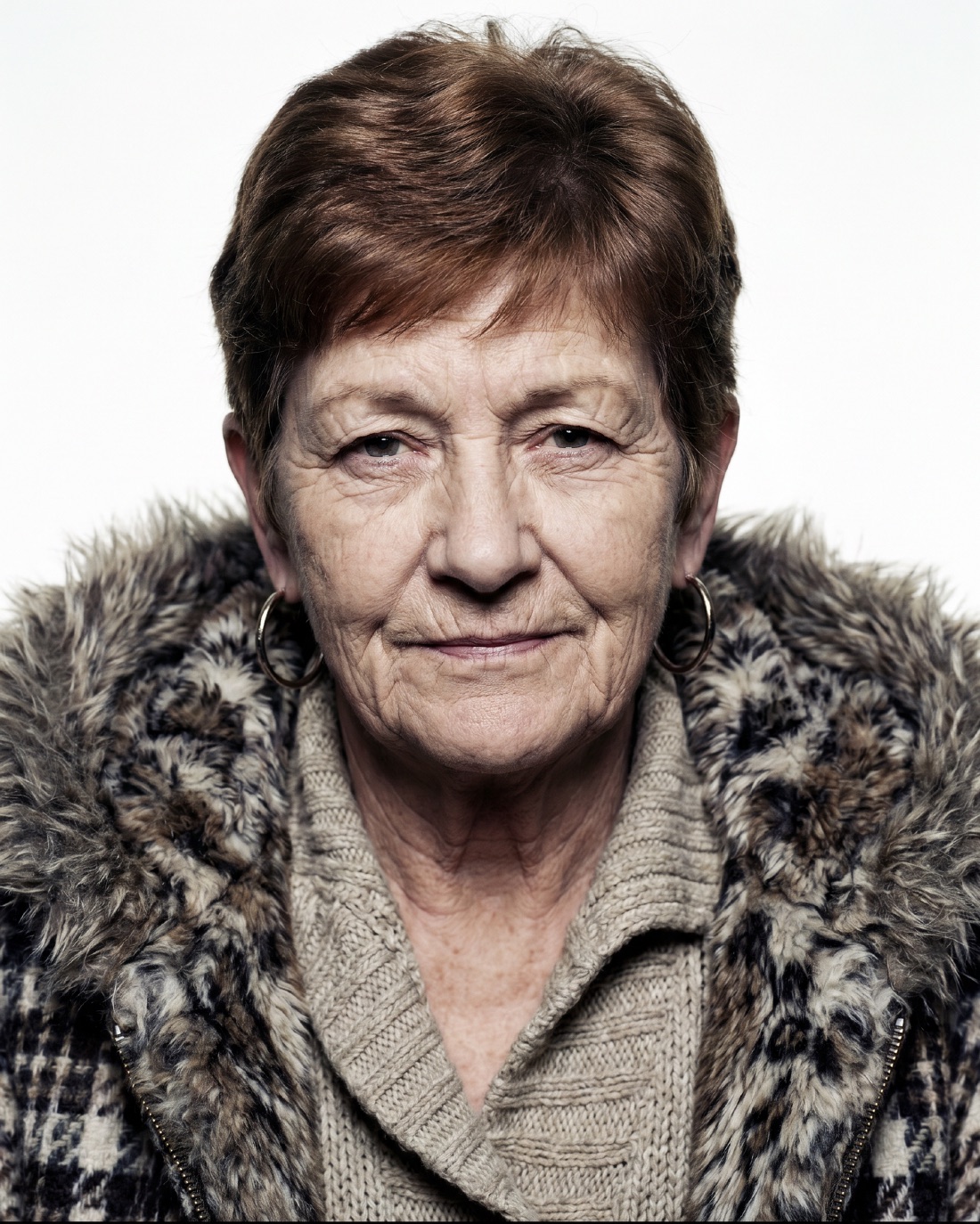 Casting portrait: fur collar, lined face
