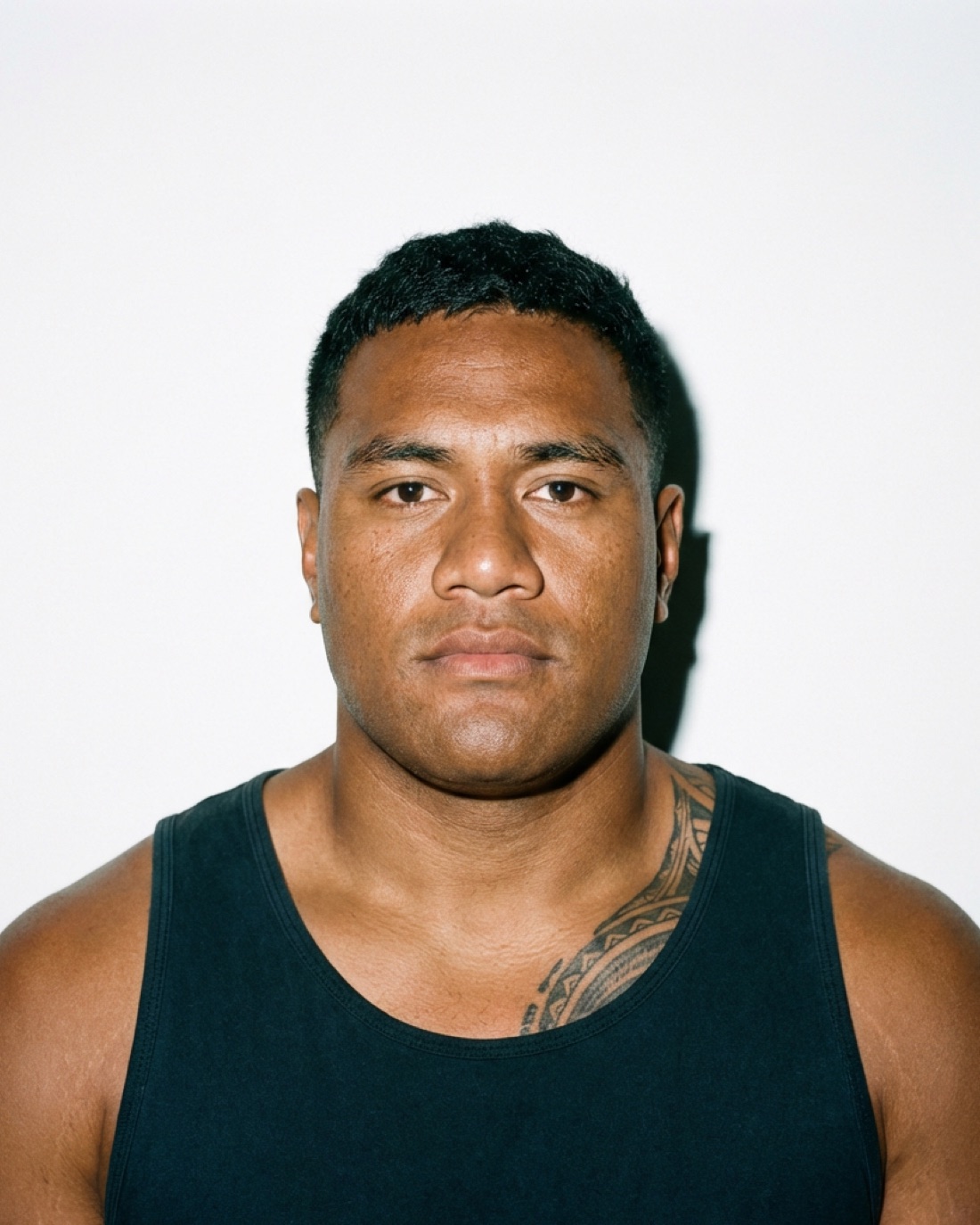 Casting portrait: heavy shoulder tattooing
