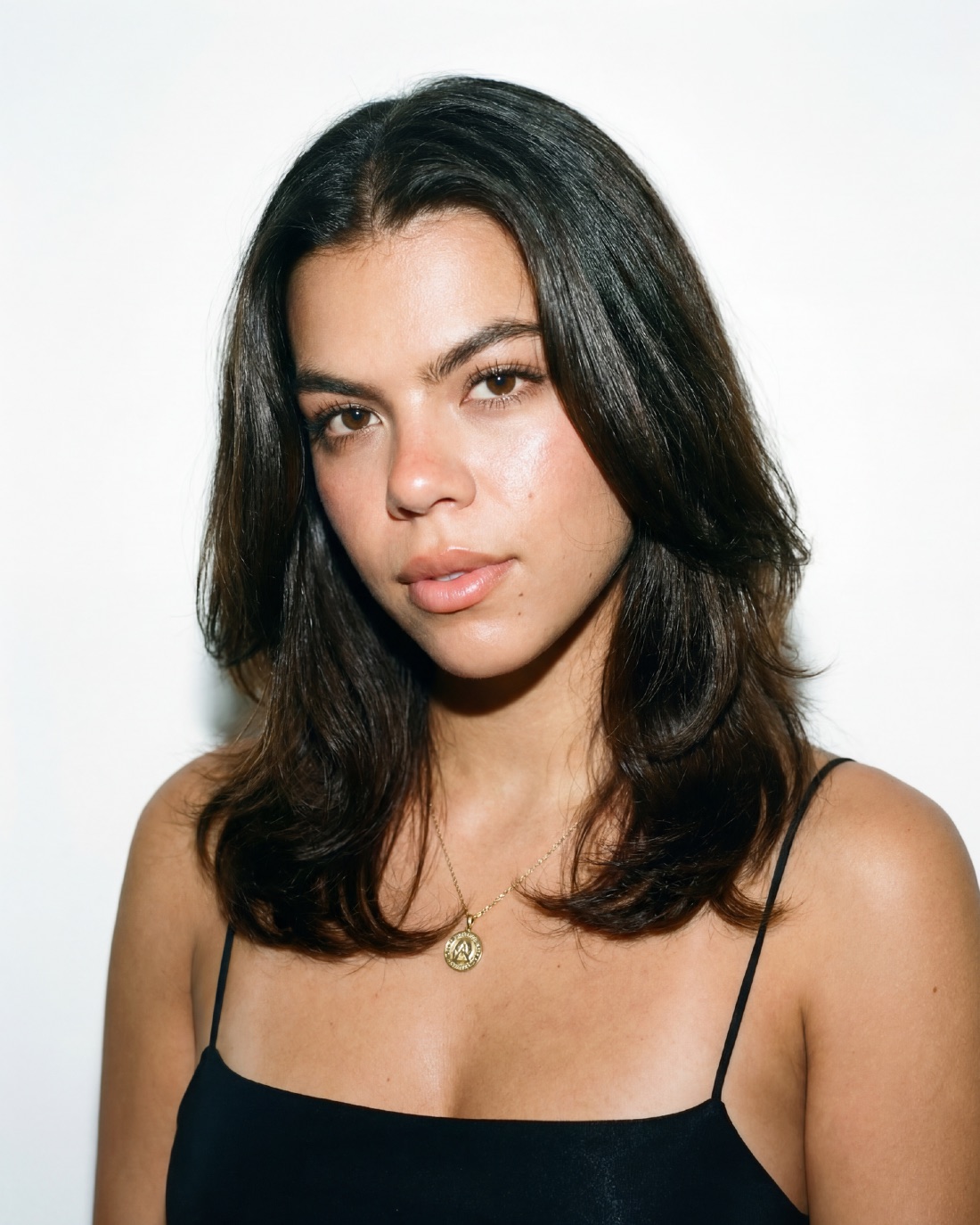 Casting portrait: long dark hair, bare shoulders